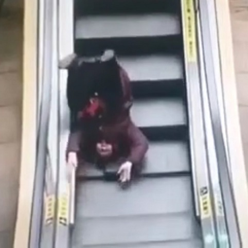 Chinese Woman Vs Escalator