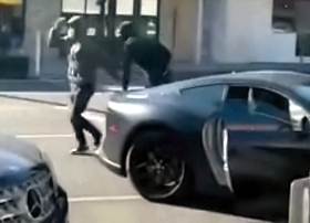 Ferrari driver beaten & robbed in Beverly Hills (2 Angles)