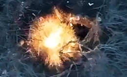 Explosive device is dropped on a foxhole with RU soldiers