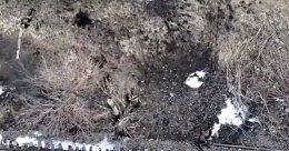 Ukrainian drone drops grenades on Russian soldiers