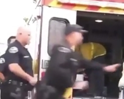LA Cop Punches Man on a Stretcher Being Put in an Ambulance