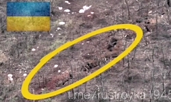 Two Ukrainian soldiers in a trench are killed by a strike