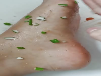 Fetish: foot preparation before cooking.