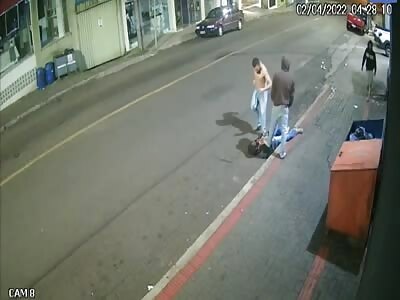 Victim beaten by 3 cowards in street 