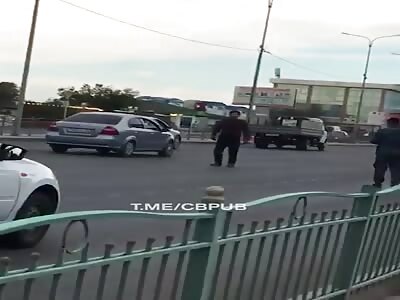 Man throws himself into truck wheels in Kazakhstan 