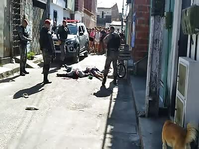 short video of two gang members from Brazil dead on the ground