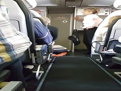 Woman Freaks Out on Airplane thinks the Plane is Going to Crash 