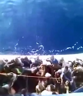 Sad and Tragic Video shows Drowning of Many Tunisian Refugees trying to get off of Raft 