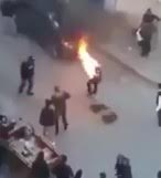 Man Self Immolates in front of Crowd 