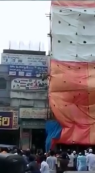 Crowd watches as Construction Worker is Electrocuted to Death on Canopy 