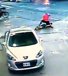 (Instant Karma) thief armed with a pistol is about to assault a couple of people but receives a brutal beating