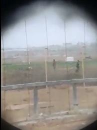 Israeli Sniper takes Out Young Palestinian over Fence and Laughs about It