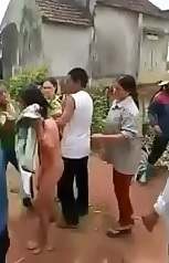Vietnamese woman is Attacked and Stripped by a Bunch of Ugly Woman 
