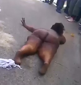Another View of Fully Nude Female Thief being Arrested 