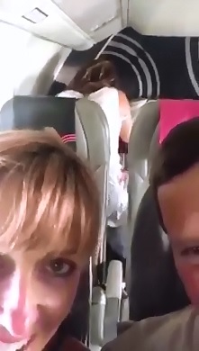 Woman gets Turned On watching Couple Fuck in the Back of an Airplane 
