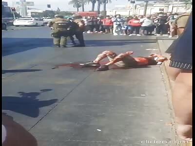 Police shoot armed robber through windshield as he was being run over