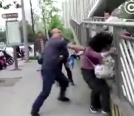  Guy doesn't care about pepper spray and keeps beating a woman