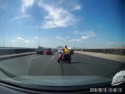 WTF is This Moronic Moped Rider Doing?