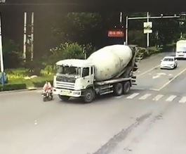 Women on Scooter Crushed to Death by Cement Truck