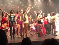 Group of Dancing Bitches Fall Through Stage