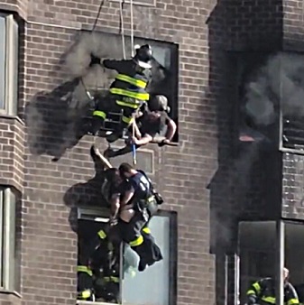 NYC Firefighters Rescue Woman Dangling From Window During Apartment Blaze