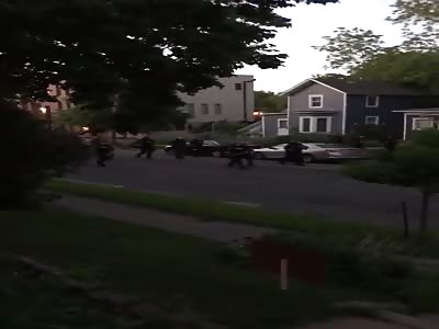 Minneapolis cop shooting at people standing on their front porch (Edited title)
