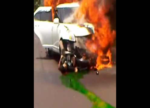 The Motorcyclist Man Burns Slowly After Crashing Into A Car