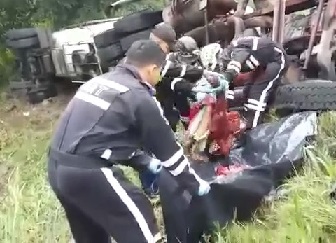 Unrecognizable Woman's Body Crushed by a Huge Truck