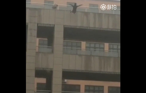Suicidal Man Jumps off building 
