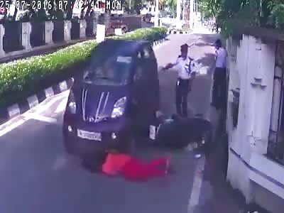 WOMAN HITTING A WOMAN IN SCOOTY WITH HER CAR