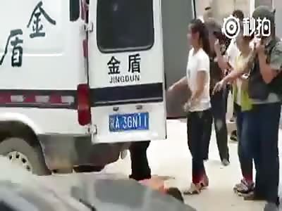 Woman crushed by cash transport Car.