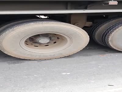 MAN DIES CRUSHED BY TRUCK TIRES