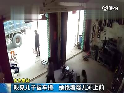 Mother Holding a Baby Gets Run Over by Truck while Trying to save Her other Son