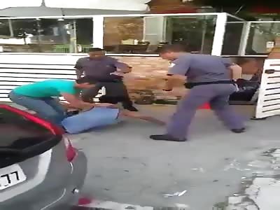 police beat the shit out of homeless and woman trying to defend him