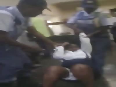 south Africa police brutality against female