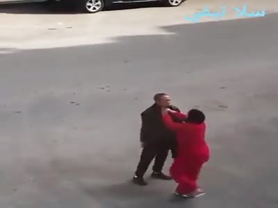 Moroccan woman slapped her infethfull husband very hard in street 