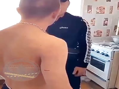Russian husband abusing his wife in front of her father 
