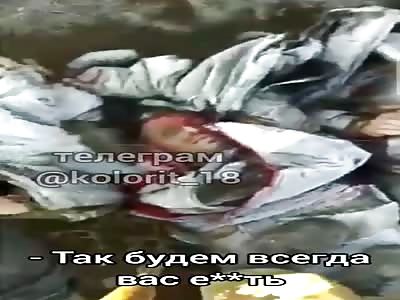 Azerbaijani soldiers abusing dead enemies soldiers corps 