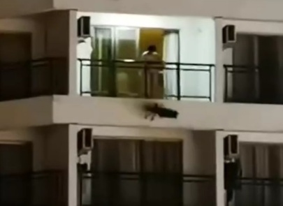 Crazy naked woman throws her child off the balcony  