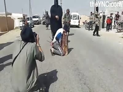 NEW ISIS Execution: Beheading by SWORD!