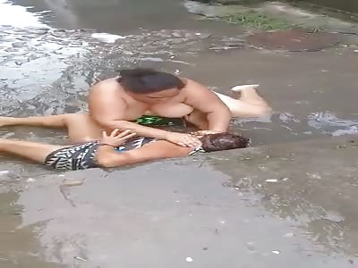Big Woman with her Boob Hanging out Stomps another Bitch in the Ghetto