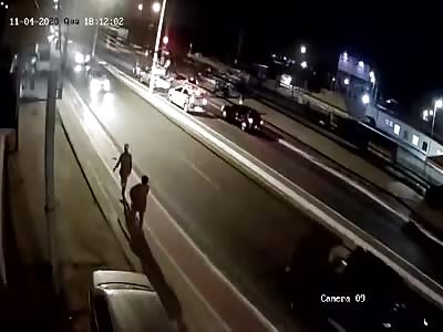 CCTV, man is hit by motorcycle.