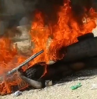 Haitian Mob Burns Suspected Gang Member Alive