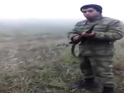 An Azerbaijani Soldier Uses An Armenian As Target Practice