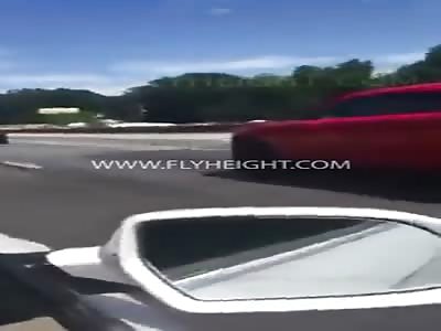Dude driving a challenger caught on video