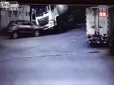 Three people inside an SUV crushed by a cement mixer