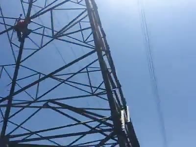 Man commits suicide by jumping off an electric tower in front of his family