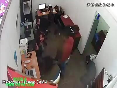 Robbers tie up staff and lock them in a room after they rob a telephone shop in Mexico
