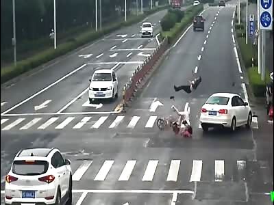 Car collided into two motorcyclist on a bike in Ningbo 