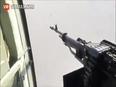 Iraqi MI-17 door gunner destroys an ISIS vehicle